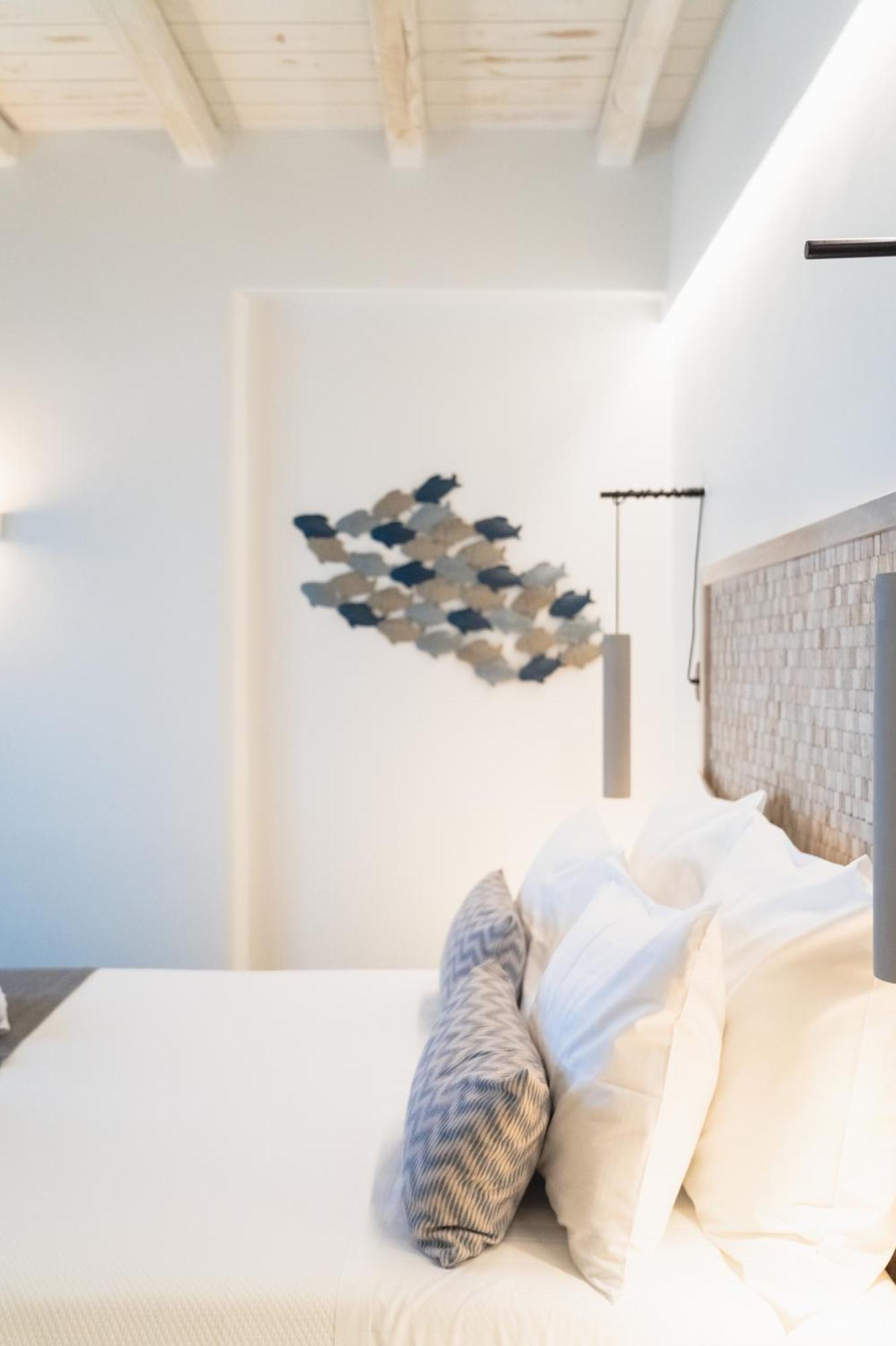 Lithos Luxury Suites Tinos Exterior photo